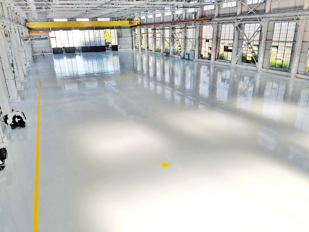 Resin floor system used in a manufacturing and production area